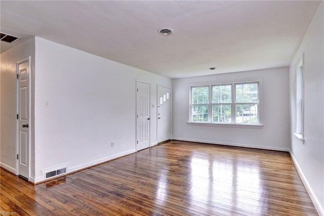513 W Maynor Dr, Williamsburg, VA 23185 - spare room featuring wood finished floors