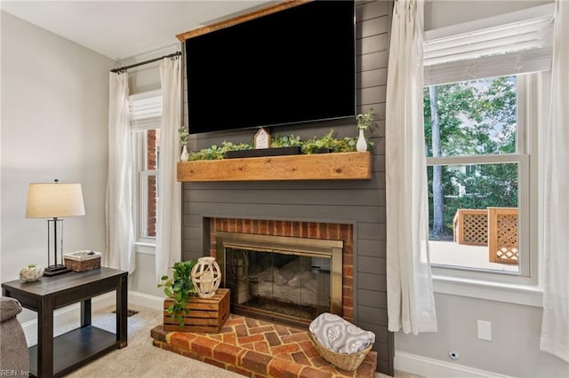 713 Tupelo Xing, Chesapeake, VA 23320 - carpeted living area featuring a fireplace and baseboards
