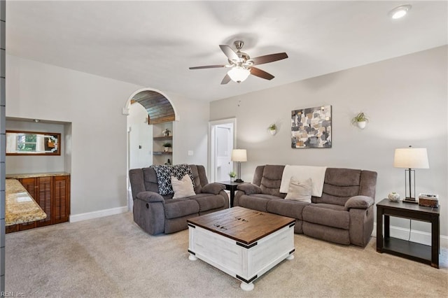 713 Tupelo Xing, Chesapeake, VA 23320 - living room with light colored carpet, ceiling fan, and arched walkways