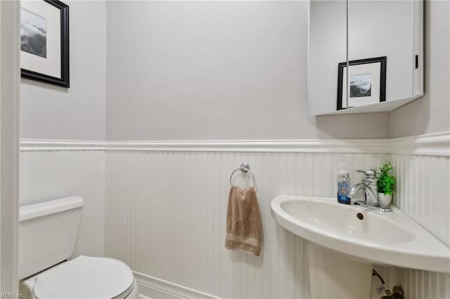 713 Tupelo Xing, Chesapeake, VA 23320 - half bathroom with toilet and a wainscoted wall