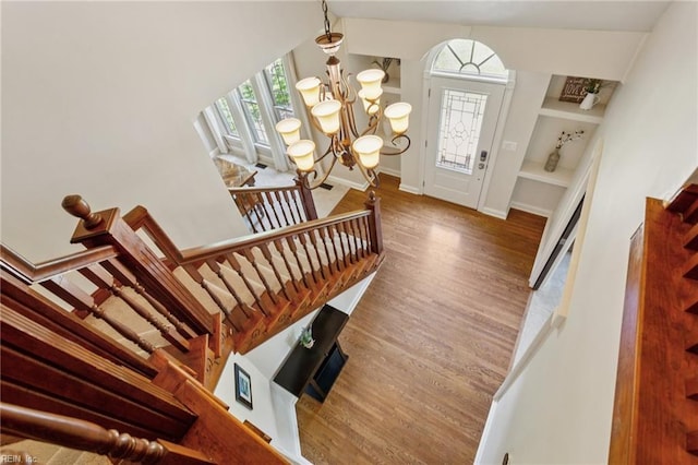713 Tupelo Xing, Chesapeake, VA 23320 - foyer featuring wood finished floors, a chandelier, and stairway