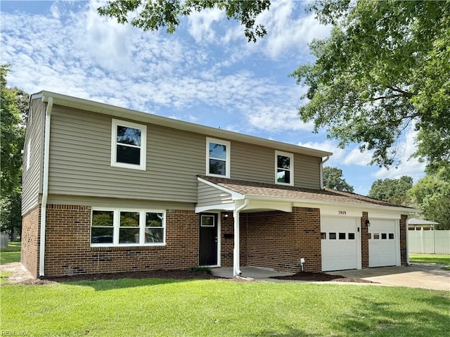 3909 Old Tree Ln, Virginia Beach, VA 23452 - view of front facade with brick siding, driveway, and an attached garage