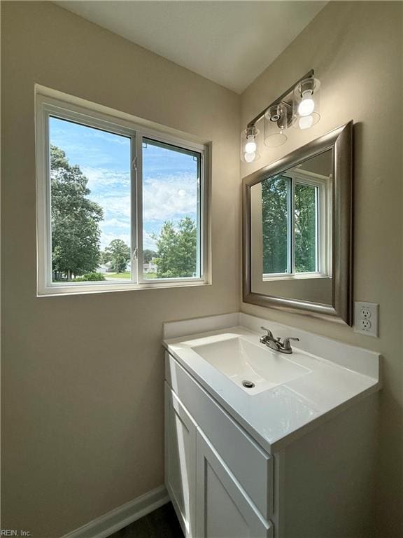 3909 Old Tree Ln, Virginia Beach, VA 23452 - bathroom with vanity and baseboards