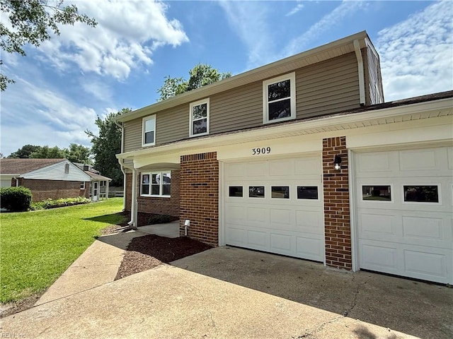 3909 Old Tree Ln, Virginia Beach, VA 23452 - traditional home featuring brick siding, driveway, a front yard, and a garage