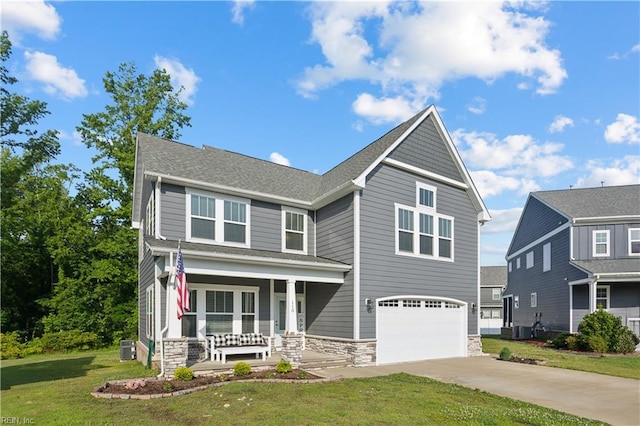 110 Sea Hero Ct, Suffolk, VA 23435 - view of front of property featuring covered porch, stone siding, an attached garage, and concrete driveway