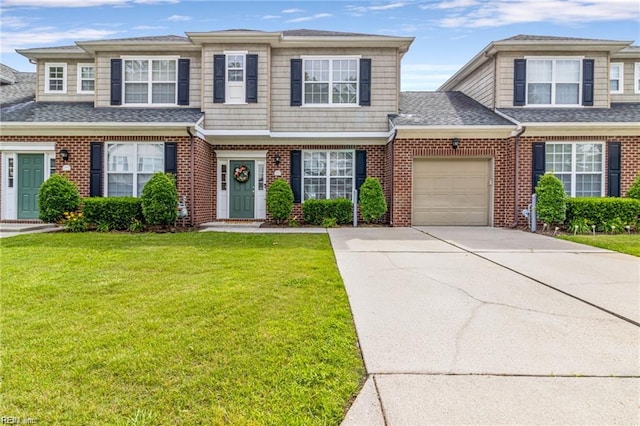 1439 Otterbourne Cir, Chesapeake, VA 23320 - townhome / multi-family property featuring an attached garage, driveway, brick siding, a front lawn, and a shingled roof