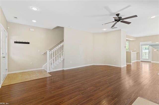 1439 Otterbourne Cir, Chesapeake, VA 23320 - unfurnished living room featuring wood finished floors, stairway, a ceiling fan, and recessed lighting