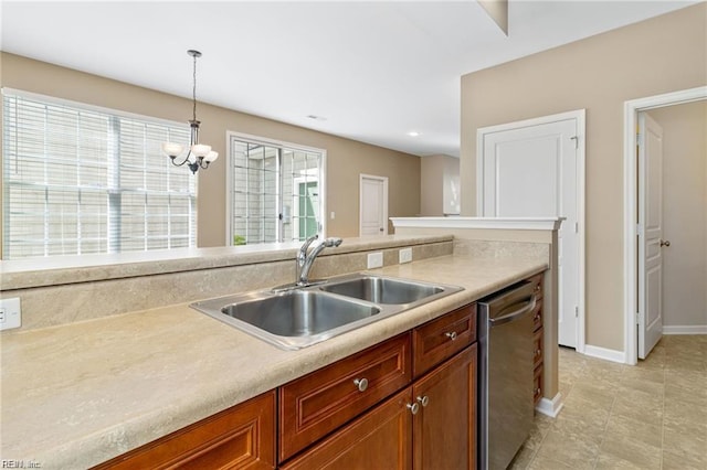 1439 Otterbourne Cir, Chesapeake, VA 23320 - kitchen with dishwasher, hanging light fixtures, light countertops, brown cabinets, and recessed lighting