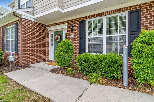 1439 Otterbourne Cir, Chesapeake, VA 23320 - view of exterior entry featuring brick siding