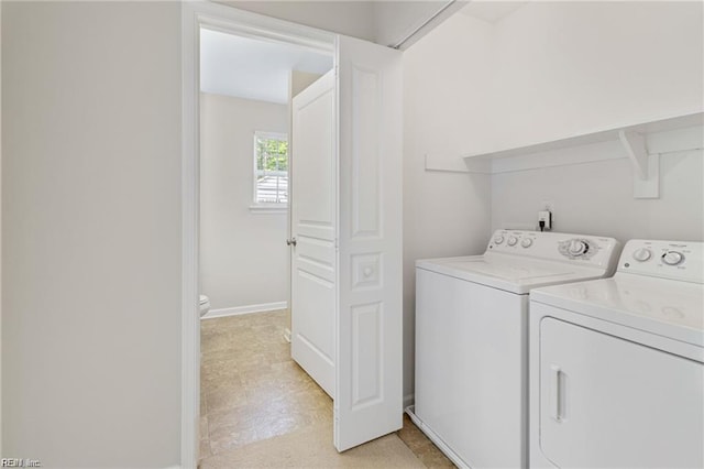 1439 Otterbourne Cir, Chesapeake, VA 23320 - laundry area with separate washer and dryer and baseboards