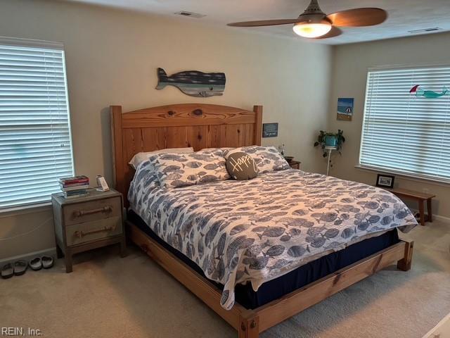 11361 Lena Rose St, Windsor, VA 23487 - bedroom featuring light carpet and a ceiling fan