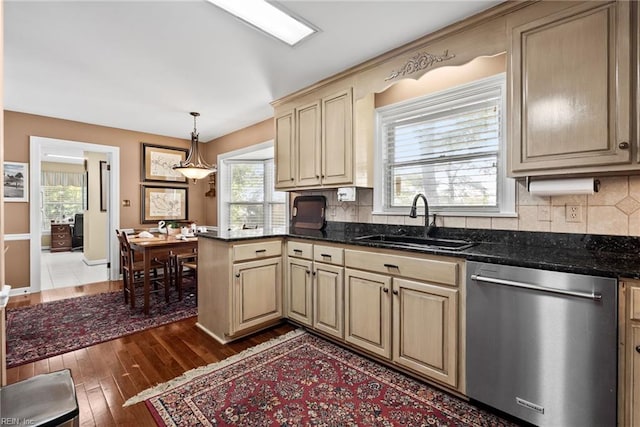 525 Pagan Rd, Smithfield, VA 23430 - kitchen with dishwasher, wood-type flooring, tasteful backsplash, and a peninsula