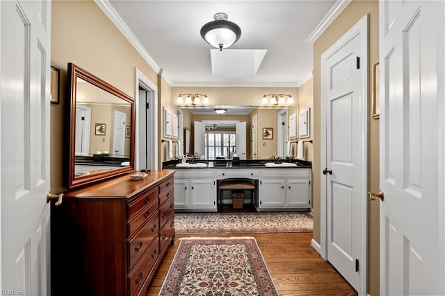 525 Pagan Rd, Smithfield, VA 23430 - full bathroom featuring double vanity, wood finished floors, and ornamental molding