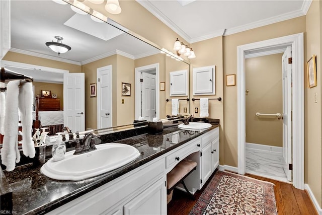 525 Pagan Rd, Smithfield, VA 23430 - full bathroom featuring double vanity, crown molding, and wood finished floors