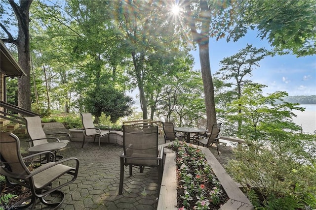 525 Pagan Rd, Smithfield, VA 23430 - view of patio with a water view and outdoor dining space