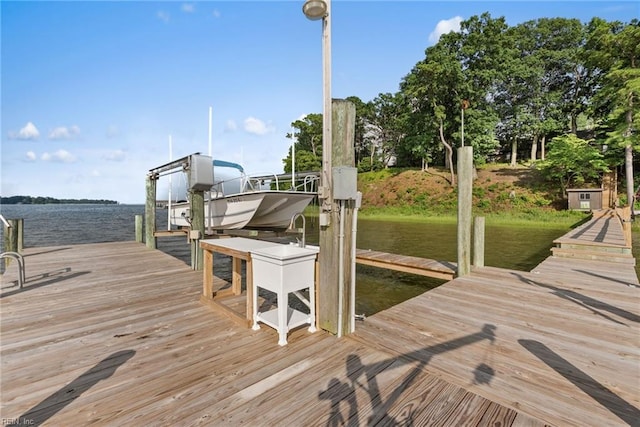 525 Pagan Rd, Smithfield, VA 23430 - dock featuring boat lift and a water view
