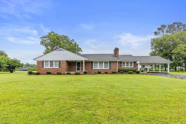32391 S Main St, Boykins, VA 23827 - single story home featuring a carport, a chimney, a front lawn, and brick siding