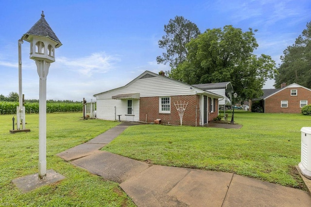 32391 S Main St, Boykins, VA 23827 - view of front of house with brick siding and a front lawn