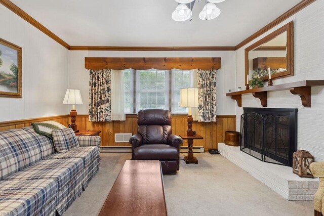 32391 S Main St, Boykins, VA 23827 - carpeted living area featuring a baseboard heating unit, baseboard heating, crown molding, a wainscoted wall, and a chandelier