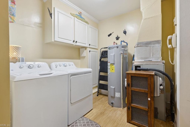 32391 S Main St, Boykins, VA 23827 - washroom with water heater, cabinet space, washer and dryer, light wood-style flooring, and ornamental molding
