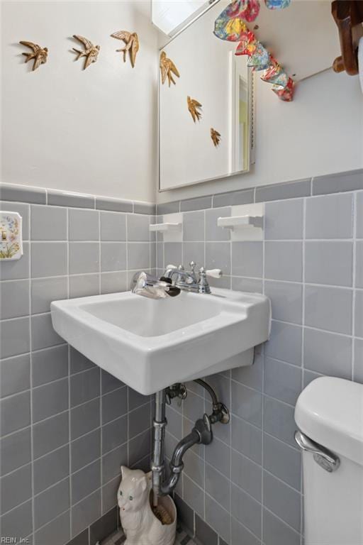 32391 S Main St, Boykins, VA 23827 - bathroom featuring tile walls and wainscoting