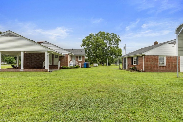 32391 S Main St, Boykins, VA 23827 - view of grassy yard featuring cooling unit