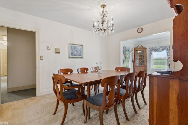 32391 S Main St, Boykins, VA 23827 - dining room featuring light carpet and a chandelier