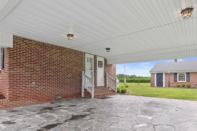 32391 S Main St, Boykins, VA 23827 - view of patio featuring an attached carport and entry steps