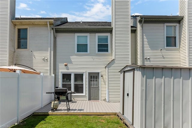 284 Windbrooke Ln, Virginia Beach, VA 23462 - back of property featuring a storage shed, a deck, and a chimney
