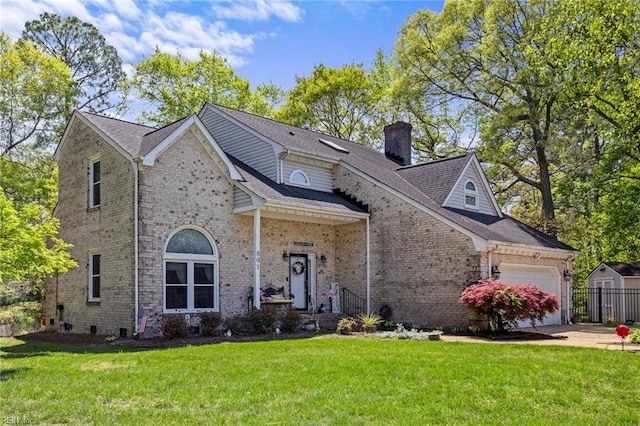 801 Kings Creek Dr, Virginia Beach, VA 23464 - view of front facade with a chimney, brick siding, an attached garage, and driveway