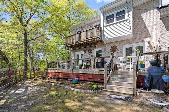 801 Kings Creek Dr, Virginia Beach, VA 23464 - back of house with brick siding, french doors, a balcony, and a deck
