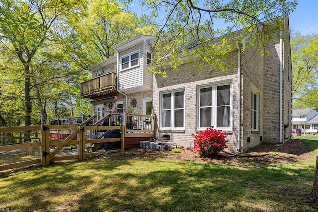801 Kings Creek Dr, Virginia Beach, VA 23464 - rear view of house featuring a balcony, a yard, brick siding, a wooden deck, and crawl space