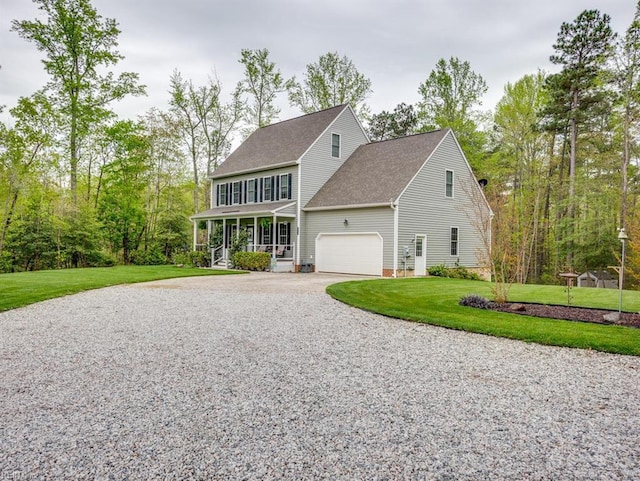 405 Oaktree Rd, Williamsburg, VA 23188 - colonial-style house with driveway, a porch, a front yard, an attached garage, and roof with shingles