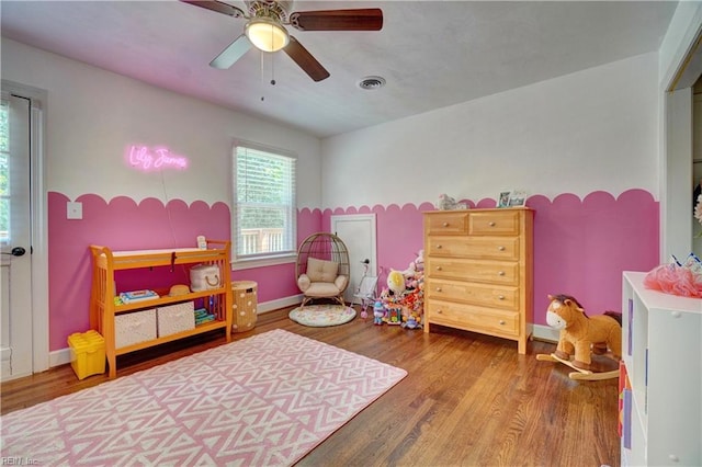 2816 Ashwood Dr, Chesapeake, VA 23321 - bedroom with wood finished floors and a ceiling fan
