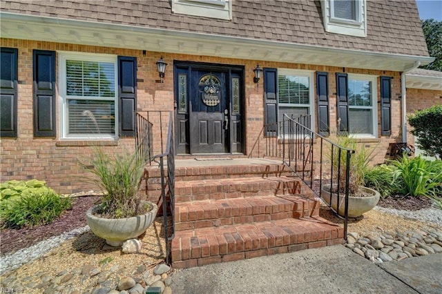 2816 Ashwood Dr, Chesapeake, VA 23321 - doorway to property with roof with shingles, brick siding, and mansard roof