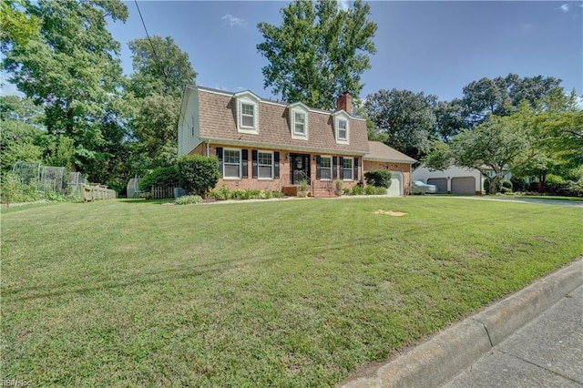 2816 Ashwood Dr, Chesapeake, VA 23321 - colonial inspired home featuring brick siding, a chimney, a gambrel roof, a garage, and a shingled roof