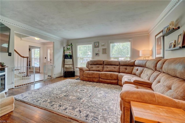 2816 Ashwood Dr, Chesapeake, VA 23321 - living area with healthy amount of natural light, hardwood / wood-style floors, stairs, and crown molding