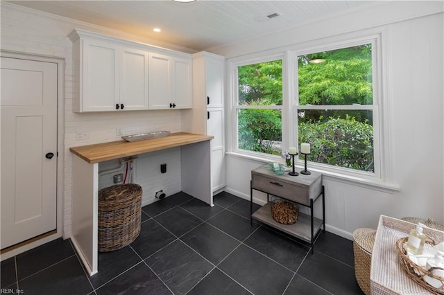 1009 Abingdon Rd, Virginia Beach, VA 23451 - office space with dark tile patterned flooring and baseboards