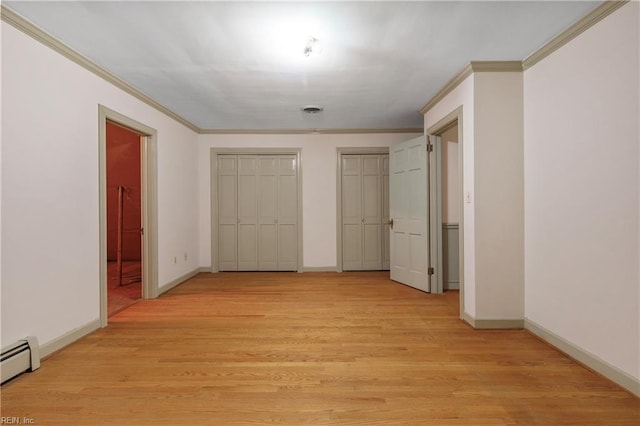 116 Crittenden Ln, Newport News, VA 23606 - corridor featuring a baseboard radiator, crown molding, and light wood-style flooring