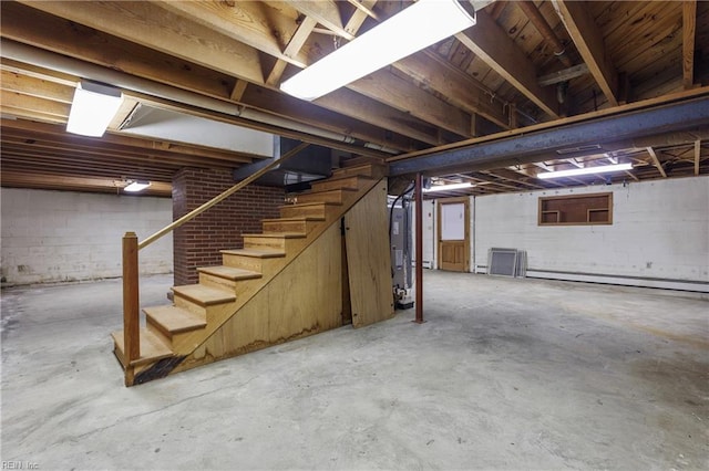 116 Crittenden Ln, Newport News, VA 23606 - unfinished basement with stairway, water heater, and a baseboard heating unit