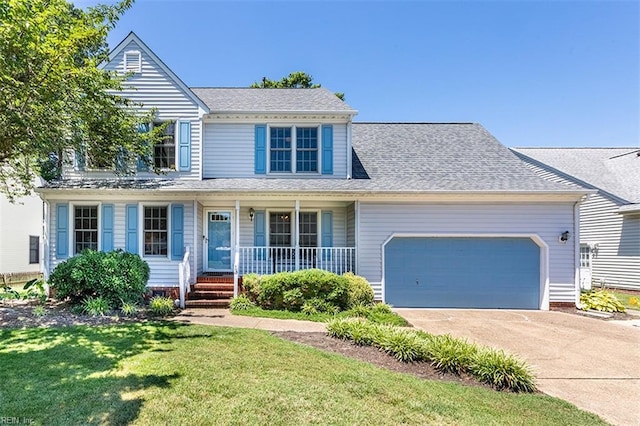 13 Fawn Cir, Hampton, VA 23666 - traditional home featuring a porch, an attached garage, a front yard, and driveway