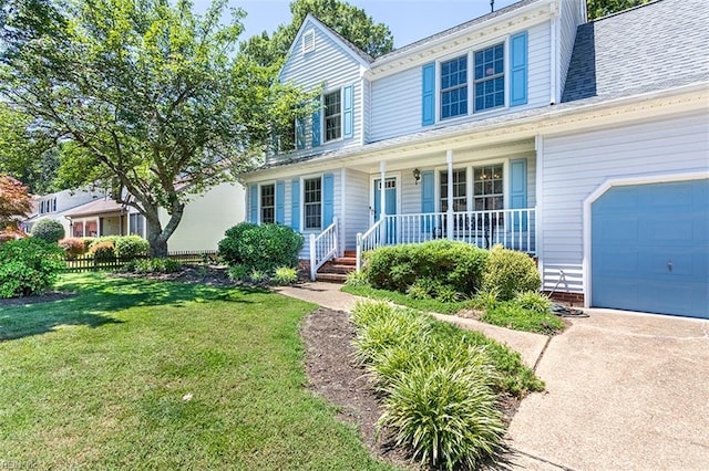 13 Fawn Cir, Hampton, VA 23666 - traditional-style house featuring covered porch, a front lawn, and concrete driveway