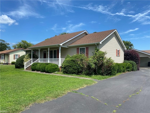 2016 Kilby Ln, Suffolk, VA 23434 - view of front of property featuring covered porch, a front lawn, and a shingled roof