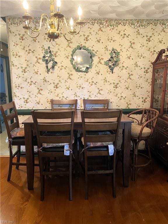 2016 Kilby Ln, Suffolk, VA 23434 - dining area with wallpapered walls, a chandelier, and wood finished floors