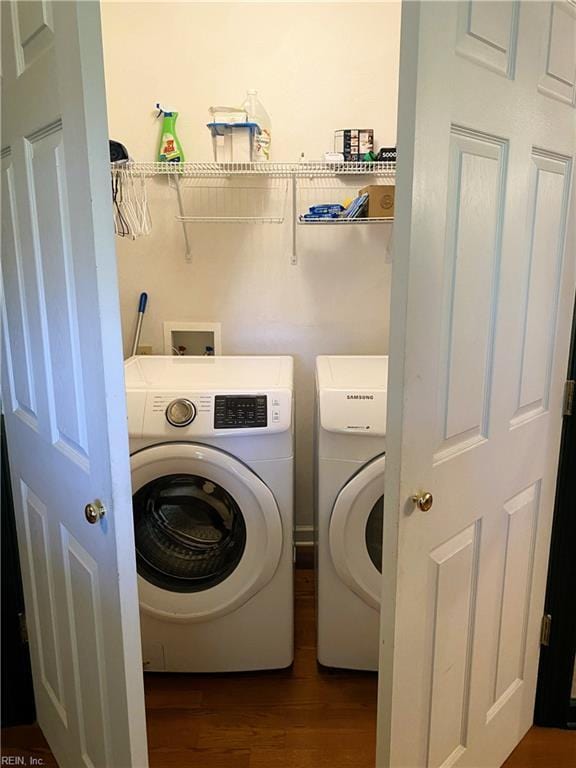 2016 Kilby Ln, Suffolk, VA 23434 - washroom featuring washing machine and clothes dryer and wood finished floors