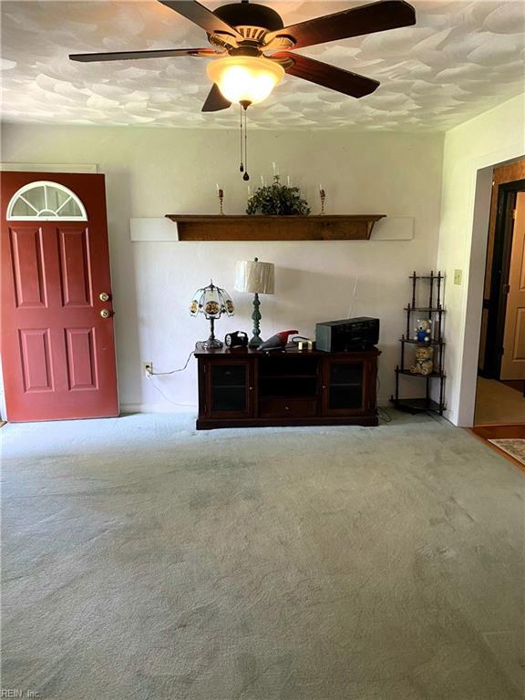 2016 Kilby Ln, Suffolk, VA 23434 - living area with carpet flooring and ceiling fan