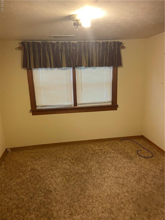 23 Forrest Dr, Newport News, VA 23606 - carpeted empty room with baseboards