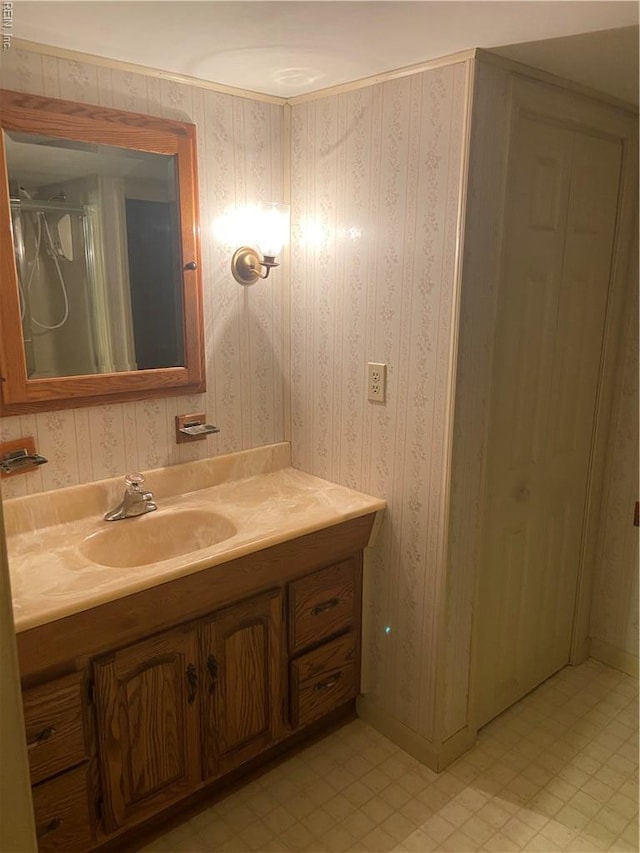 23 Forrest Dr, Newport News, VA 23606 - bathroom with vanity and wallpapered walls