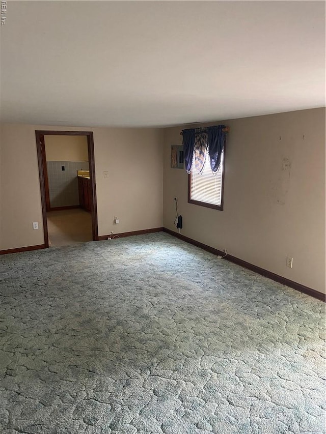 23 Forrest Dr, Newport News, VA 23606 - carpeted empty room with baseboards