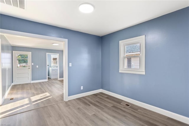 3033 Williams St, Newport News, VA 23607 - unfurnished room featuring wood finished floors and baseboards